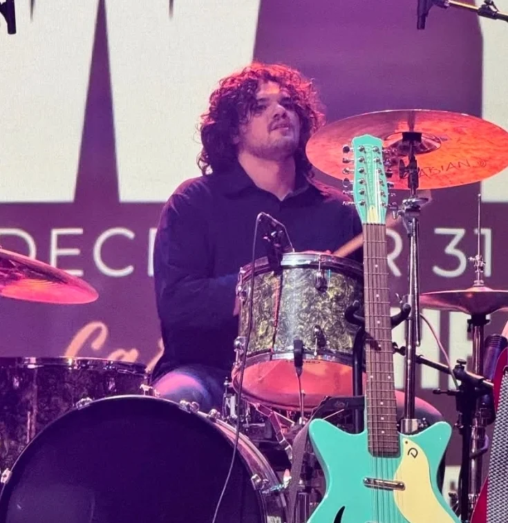 Clyde’s Electric Chalkboard drummer performing live