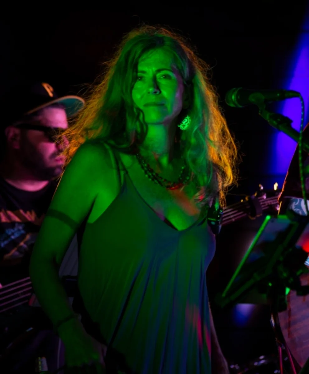Clyde’s Electric Chalkboard vocalist performing live
